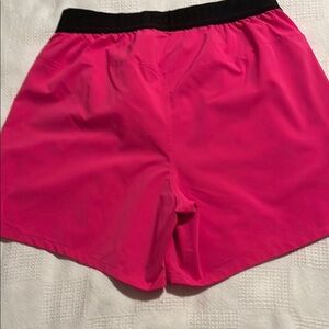 The North Face Pink Athletic Shorts Lightweight ,elastic waistband with signatur